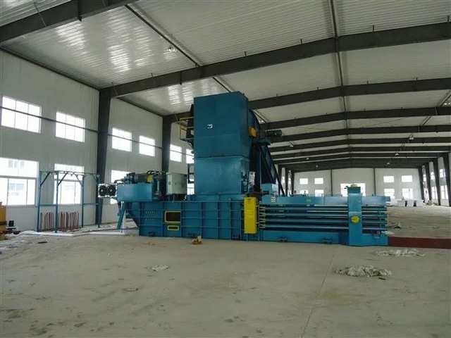 Automatic waste paper baler