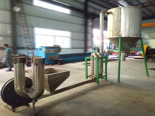 Dryer, blower hopper